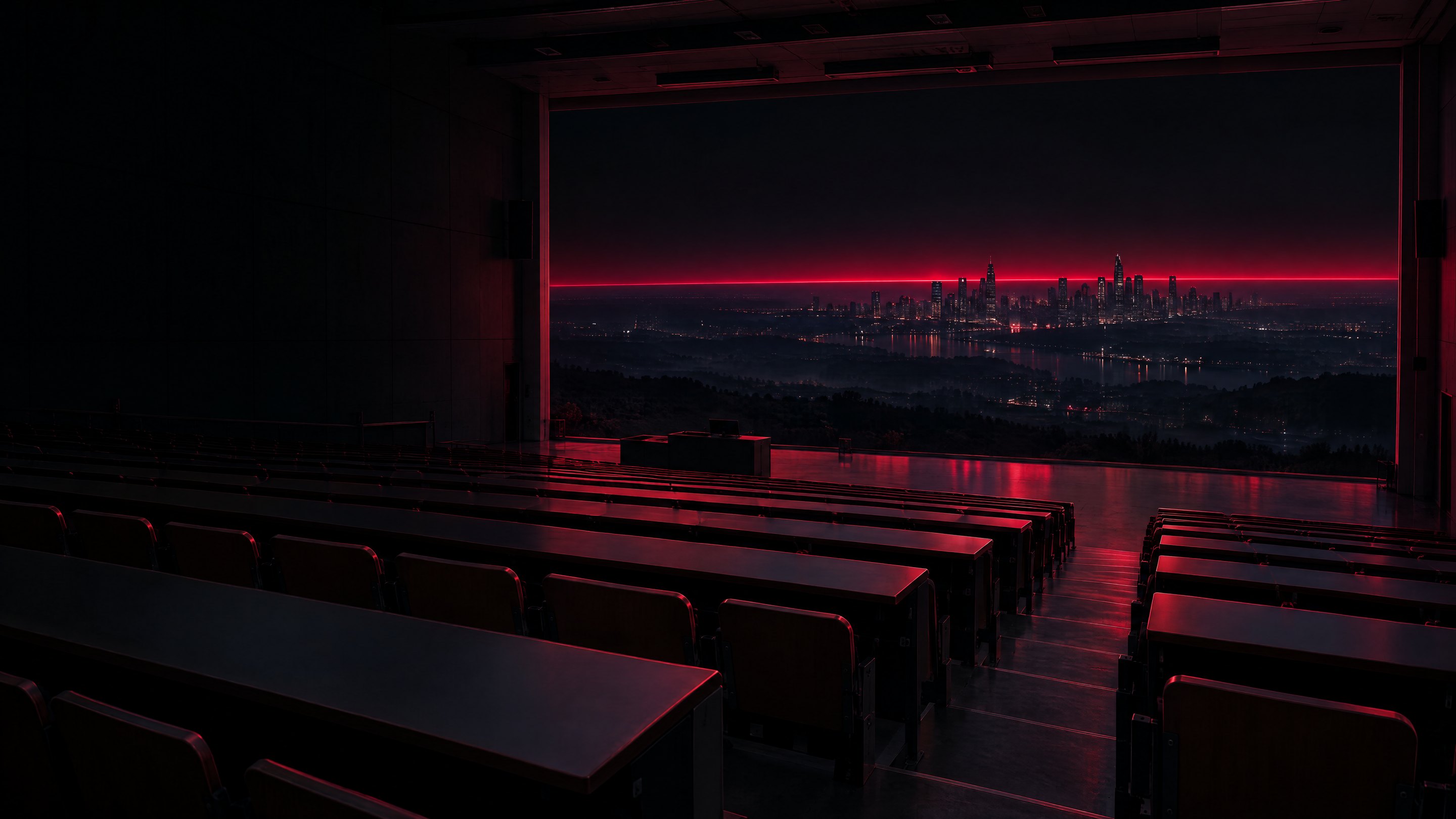 Ein dunkler Hörsaal, dessen Stirnwand sich zur Stadt öffnet